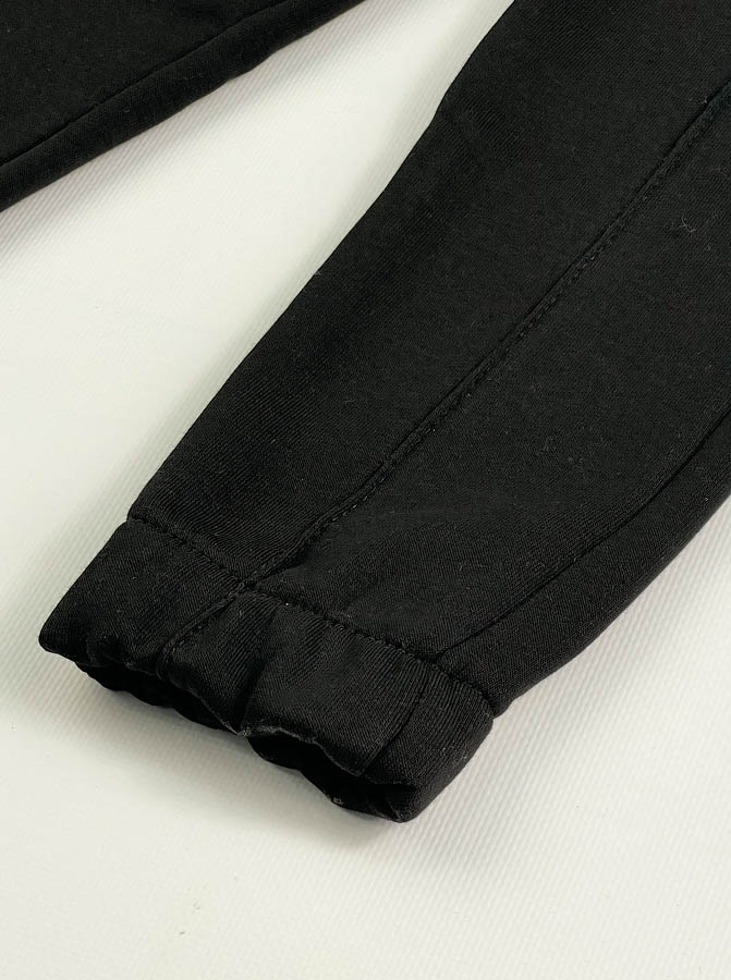 Утеплені спортивні штани для дівчинки JakPani чорні 1502 - розміри